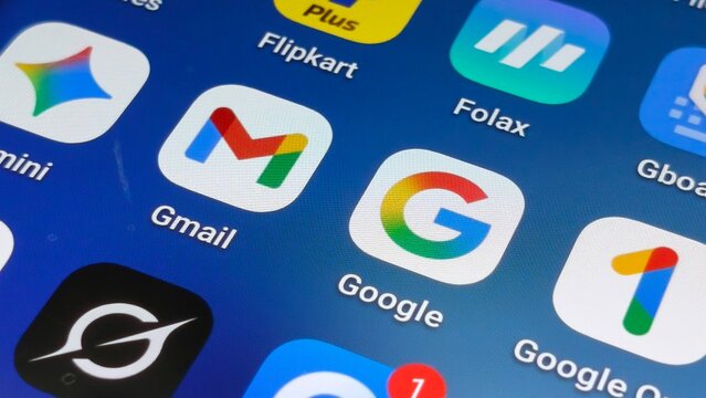 Closeup of Google and Gmail app icons on mobile device screen