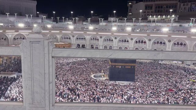 Ramazan and Eid of 2026. Ummrah Kabba Muslims People Walking During Tawaf Near Clock Tower With Foot Steps On Busy Roads In Macca Ramazan Eid Islam