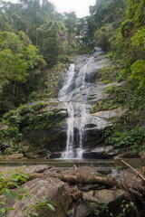 Obraz premium Idyllic scenery at Taunay Waterfall at Tijuca National Park at Brazilian city of Rio de Janeiro on a spring day. Photo taken October 13th, 2025, Rio de Janeiro, Brazil.