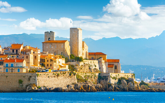 Antibes, French Riviera, historic old town above Mediterranean. Stone ramparts, terracotta roofs, Ch&acirc;teau Grimaldi, Picasso Museum, Port Vauban marina, Alpine views, Proven&ccedil;al market attract visitors
