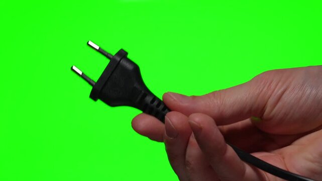 Connecting an electrical appliance to a power outlet.
Electrical plug for charging gadgets.
Electrical appliances powered by electricity.