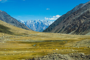 View of lakes and river with snowy mountain peak at Chang La , southern pass, a high mountain pass in Ladakh in the Greater Himalaya between Leh and the Shyok River valley. Leh, Ladakh, India.