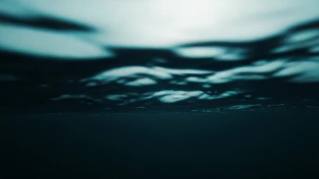 Water surface creating an abstract blue and turquoise backdrop with gentle ripples, light coming from above, reflecting an ethereal atmosphere of depth and infinity