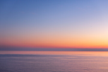 Naklejka premium Beautiful seascape of the Amalfi Coast in Italy during a colorful sunset at dusk