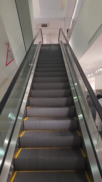 Modern Indoor Escalator in Shopping Mall Interior. Video.