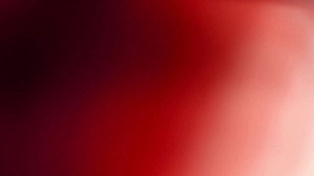 film burn transition with intense red hues, fading to black. This clip is perfect for adding dramatic effects or creating a sense of urgency.