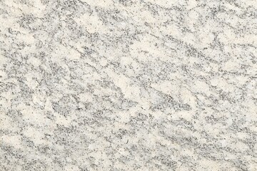 A close-up view of a beautiful, textured, granite stone pattern