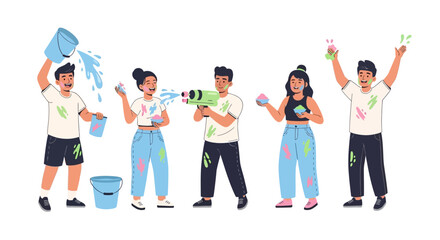 Obraz premium Group of people celebrating creative art project together, standing in a line, holding paintbrushes and colorful paint splatters