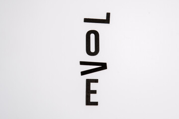 the message love on a white background