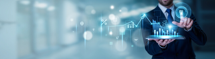 Businessman using the tablet analysis BI and business intelligence concept, data visualization,...