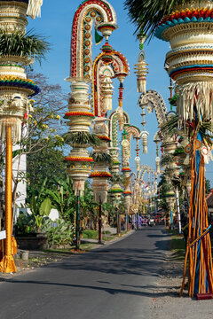 Balinese decorative penjor along the street in Desa Munggu, Badung Bali.