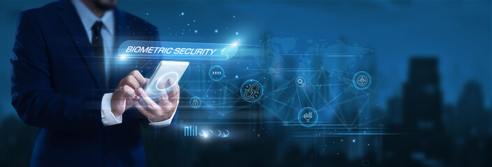 Businessman using smartphone to find and analyze biometric security data, identity verification,...