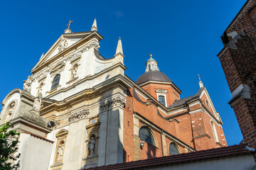 Detailed view of Baroque architecture and dome of Saints Peter and Paul Church on Grodzka Street, Krakow, Poland.