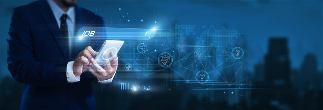 Businessman using smartphone to find and analyze IOB data, digital banking trends, online financial transactions, fintech analytics, secure banking insights