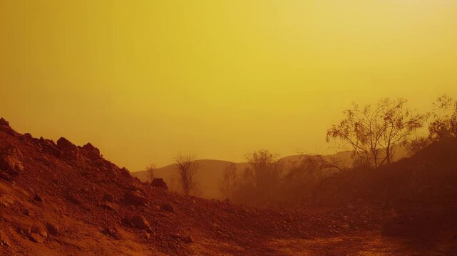 Barren extraterrestrial landscape featuring a rugged red orange terrain, sparse dry trees, and hills under a thick yellow orange atmosphere, creating a desert world concept