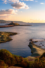 Fototapeta premium A beautiful beach in the sunset