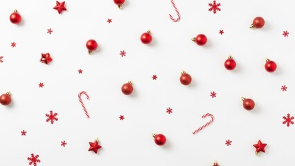 Christmas pattern with red baubles stars and candy canes on white background top view flat lay
