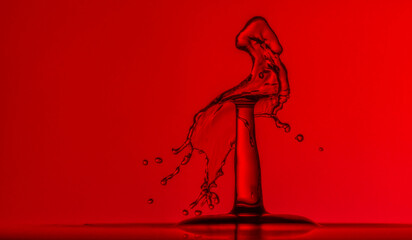 Color drops splash with umbrella or balls in fresh water