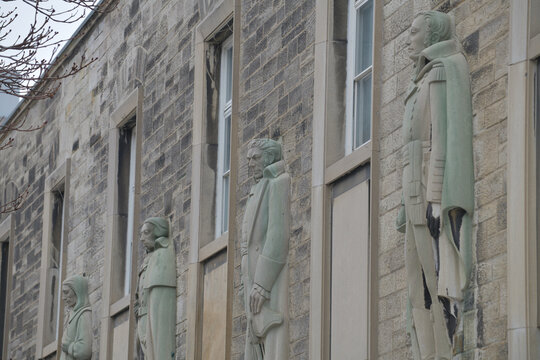 Canadiana Gallery (the former Archives of Ontario building) at 14 Queen&rsquo;s Park Crescent West, featuring Samuel de Champlain, John Graves Simcoe, Sir Guy Carleton, and James Wolfe (1951), Toronto