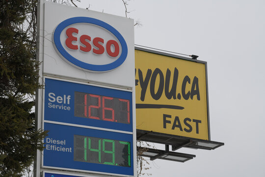 Esso gas station roadside pylon and price sign at 1070 Millwood Rd, East York Toronto