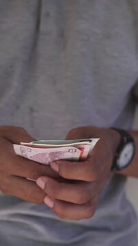 Individual counting honduran lempira banknotes financial concept