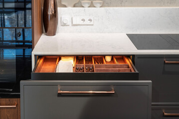Luxury kitchen storage drawer with built-in cutlery organizer
