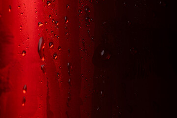 Macro Close-up of Water Condensation Droplets on Red Metallic Surface