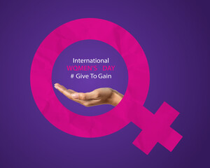 Large pink female gender symbol with supporting hand and Women&rsquo;s Day message on purple background.