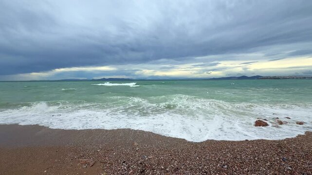Seagulls Flying Over The Waves Of The Aegean Sea, Flapping Wings In Slow Motion