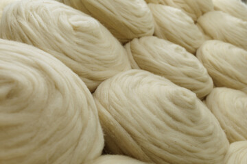 Premium merino wool fiber texture for textile manufacturing industry use © st.kolesnikov
