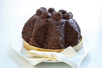 Profiteroles cake on white background 