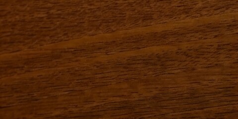 Fototapeta premium Natural rich warm brown walnut wood grain texture background