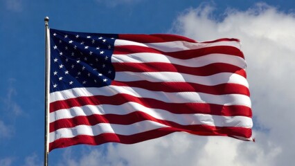 Obraz premium Waving american flag against blue sky with clouds.