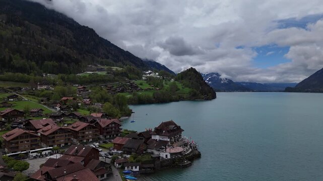 Drone Flyover view of Iseltwald village on Lake Brienz in Switzerland