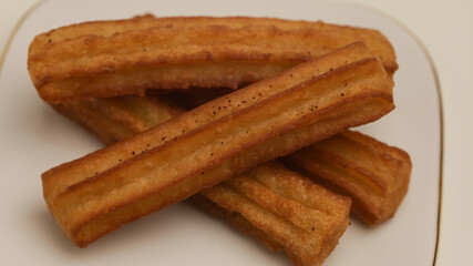 Churros on white background