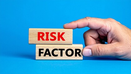 Hand Holding Wooden Blocks Showing Risk Factor On Blue Background