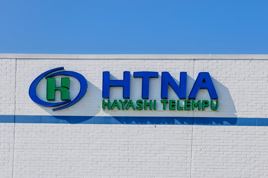 HTNA hayashi telempu corporate signage, The company is a "total supplier" of automotive interiors, NVH and advanced electronics to OEMs.