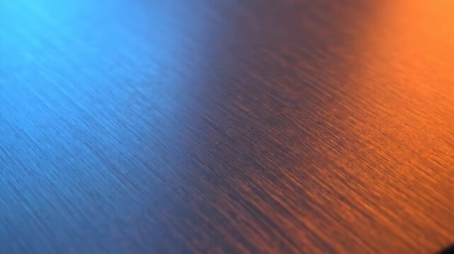 Dynamic Blue and Orange Light Reflection on Textured Surface Abstract Background.