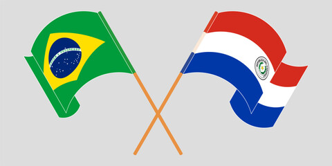 Crossed and waving flags of Brazil and Republic of Paraguay. Vector illustration