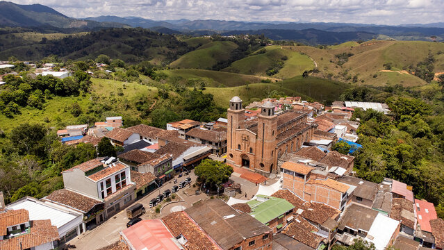 Yali, Antioquia, Colombia. October 19, 2025. Panoramic drone view of the town's main church.