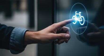 Close up of hand pressing a glowing bicycle icon to support urban mobility programs.