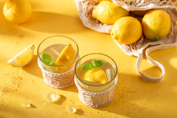 Fototapeta premium Tasty and cold lemonade with mint leaves and citrus.