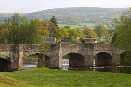 The medieval stone bridge over the River Usk at Crickhowell in the Brecon Beacons National Park on a spring day