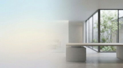 Fototapeta premium Blurred modern office interior with a large window overlooking lush greenery, creating a bright and airy workspace atmosphere.