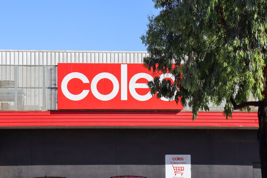 Coles supermarket logo signage above grocery store building entrance