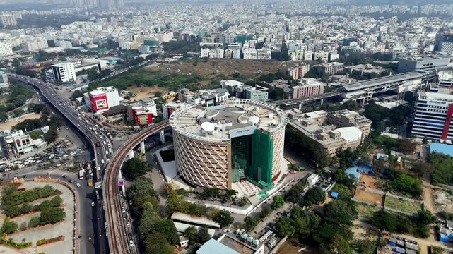 The aerial view of Cyber Towers stands as HITEC City&rsquo;s iconic landmark&mdash;its circular fa&ccedil;ade and glass core anchoring Hyderabad&rsquo;s thriving tech corridor.