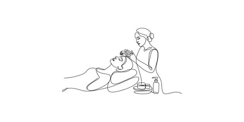 Obraz premium A simple line art illustration of a person receiving a relaxing head massage or facial treatment