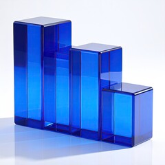 Blue glass bars, resembling a descending graph, on a reflective surface