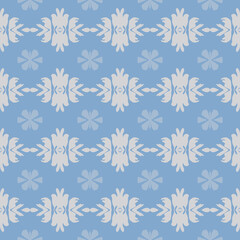 Fototapeta premium Seamless blue and white floral pattern with symmetrical design