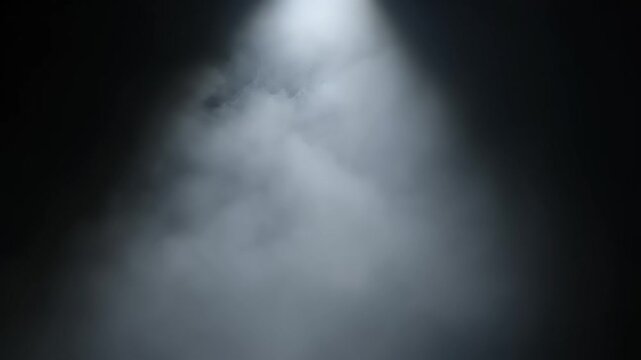 Mysterious smoke and haze effect in spotlight, atmospheric and ethereal background, abstract composition, magical moment, studio shot, evocative art.